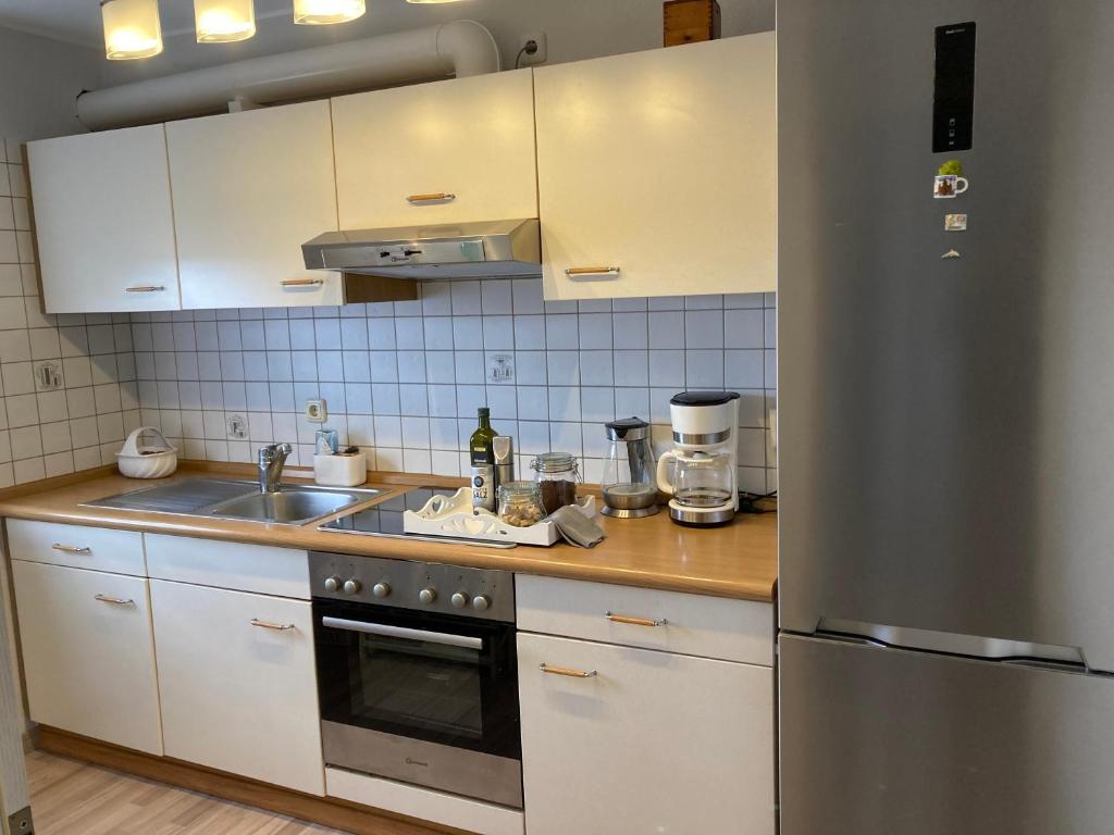 Kuchyň nebo kuchyňský kout v ubytování Wohnung 21