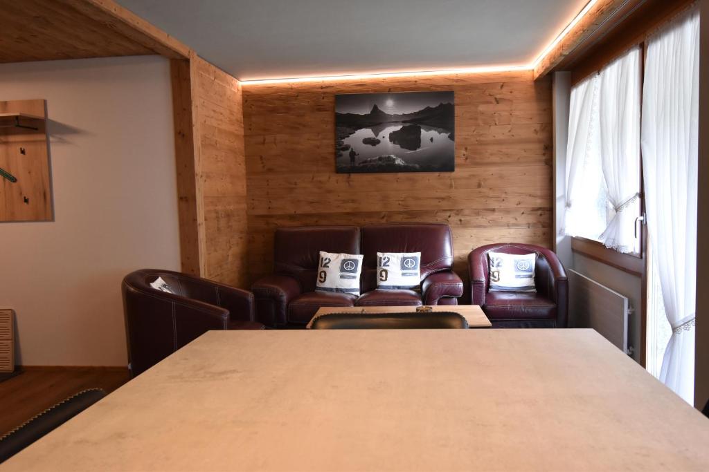 Postel nebo postele na pokoji v ubytování Hotel Matterhornblick