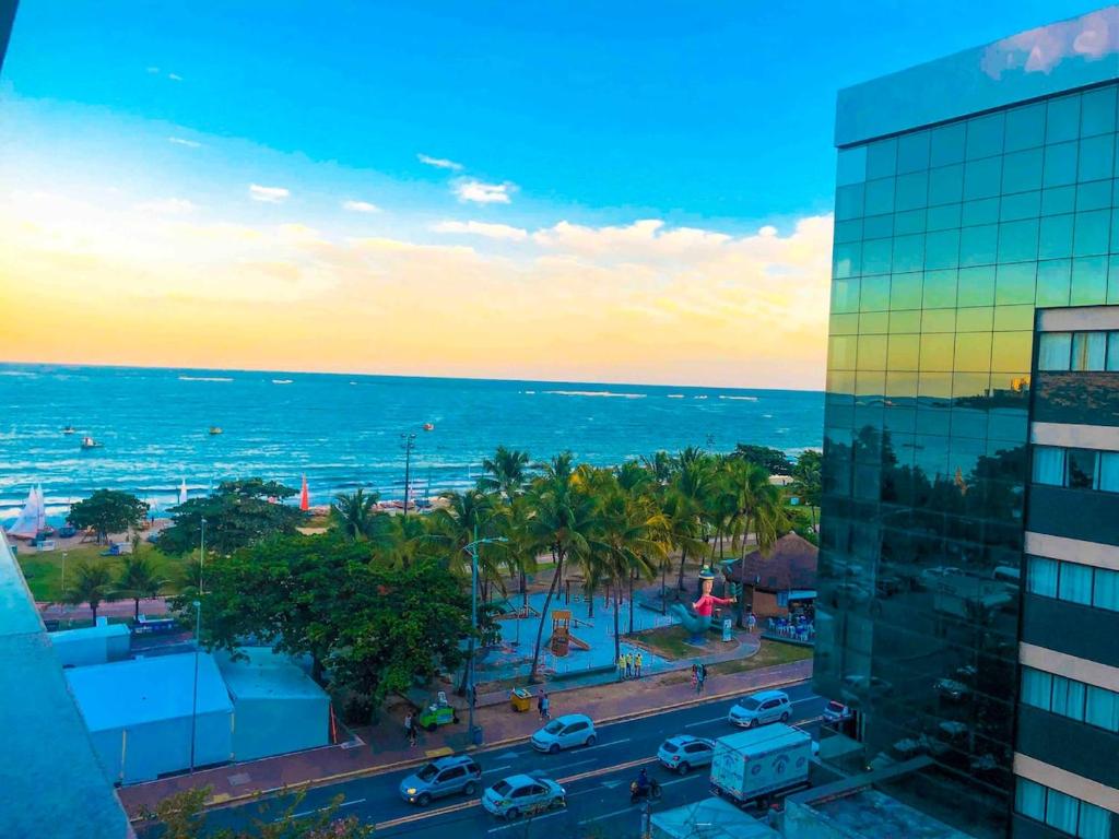 a view of the ocean from a building at T-36: Flat charmoso a Beira mar da Pajuçara in Maceió