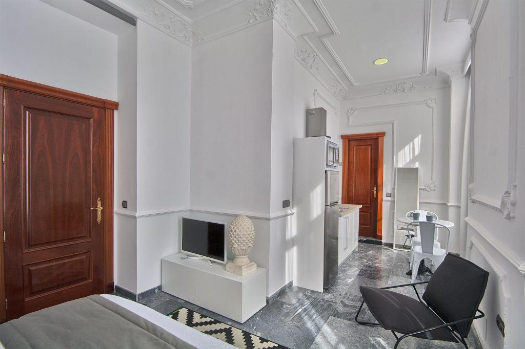 Posedenie v ubytovaní Apartamentos Plaza Constitución - Larios