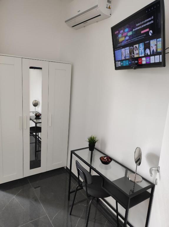 TV a/nebo společenská místnost v ubytování Oniria Suite - 100 mt dal mare