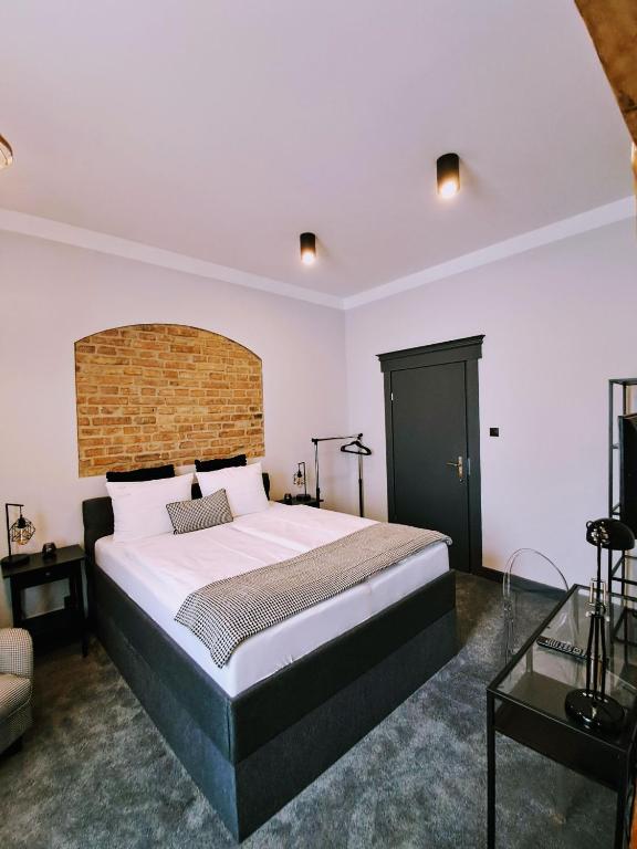 Posteľ alebo postele v izbe v ubytovaní Apartamenty "BULWAR GORZOW"