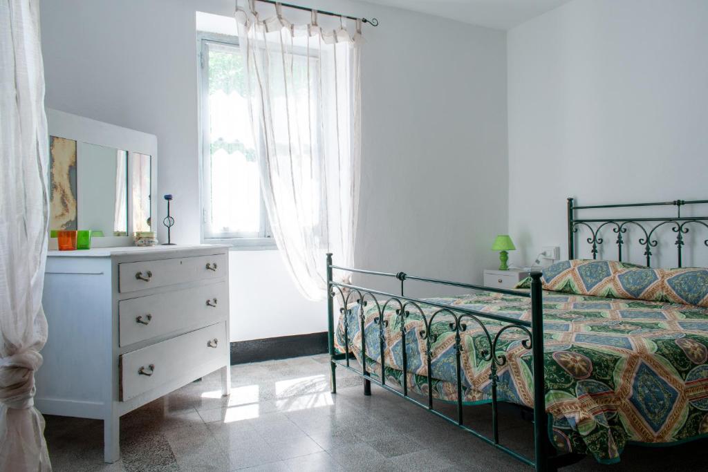 Postel nebo postele na pokoji v ubytování Casa Bertulla