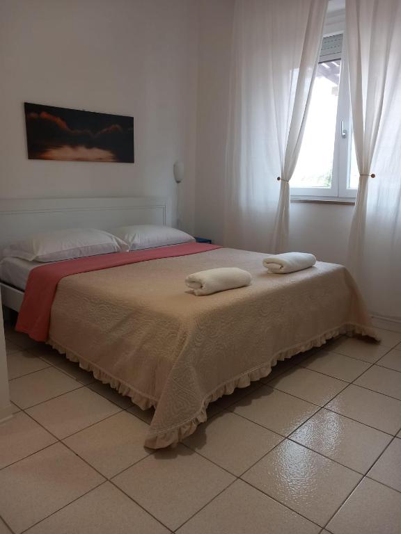 Postel nebo postele na pokoji v ubytování Dalla Fede