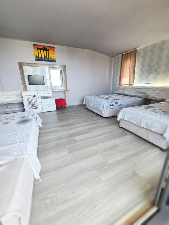 Postel nebo postele na pokoji v ubytování Diamant Otel