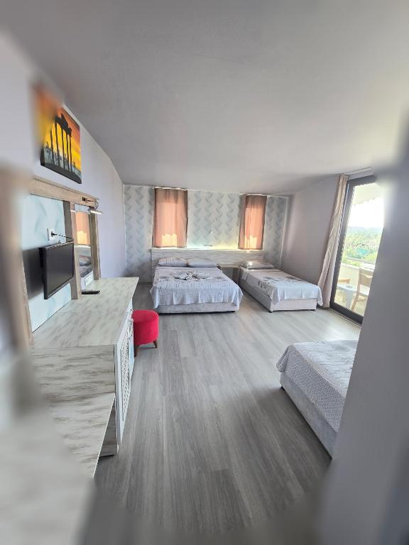 Postel nebo postele na pokoji v ubytování Diamant Otel
