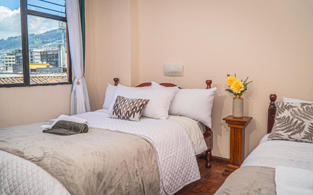 Postel nebo postele na pokoji v ubytování UKUKU Hostel