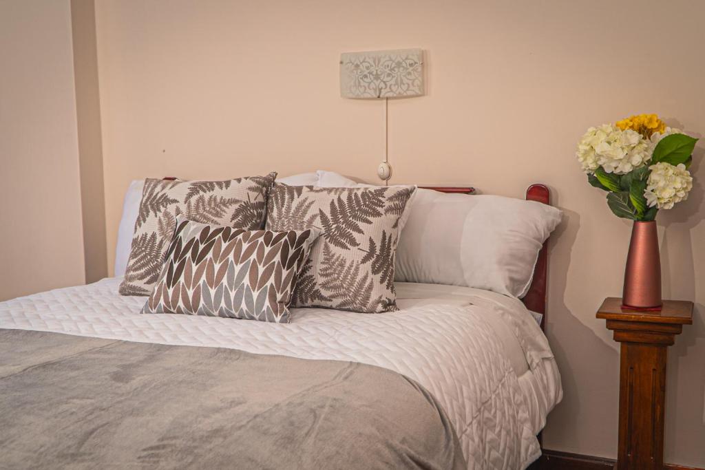 Postel nebo postele na pokoji v ubytování UKUKU Hostel