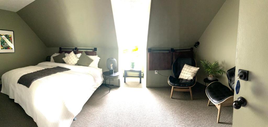 Postel nebo postele na pokoji v ubytování Auberge des Cantons