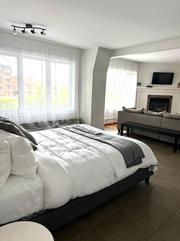 Postel nebo postele na pokoji v ubytování Auberge des Cantons