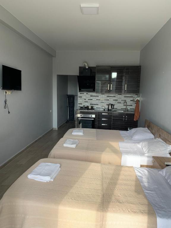 Postel nebo postele na pokoji v ubytování KARD HOUSE