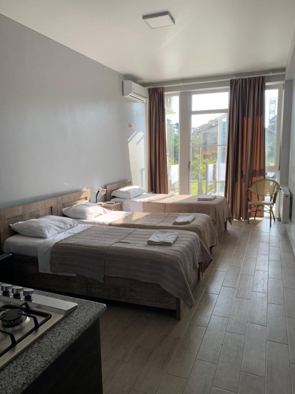 Postel nebo postele na pokoji v ubytování KARD HOUSE
