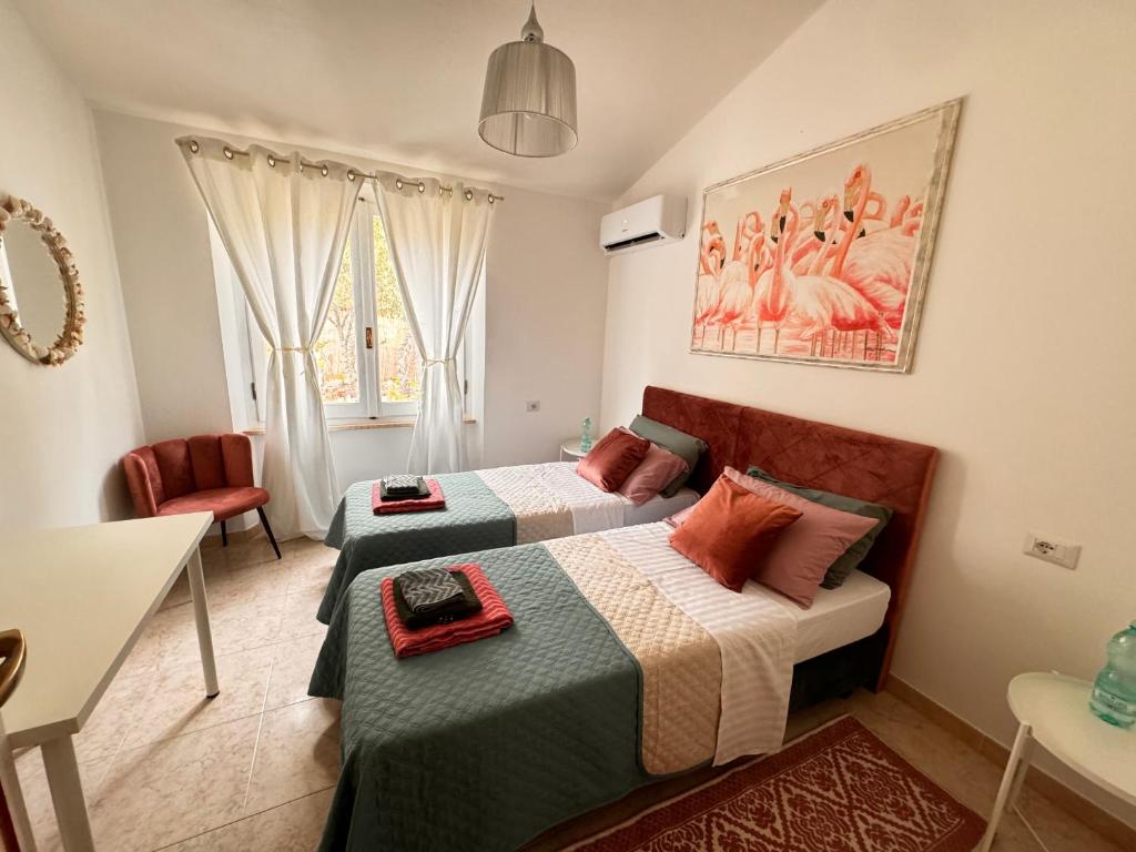 Postel nebo postele na pokoji v ubytování Villa Silmar