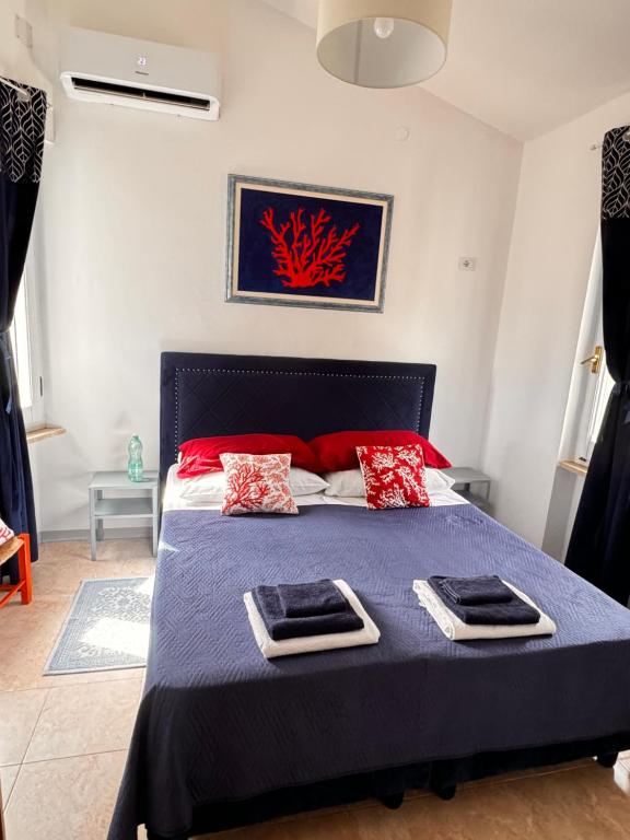 Postel nebo postele na pokoji v ubytování Villa Silmar