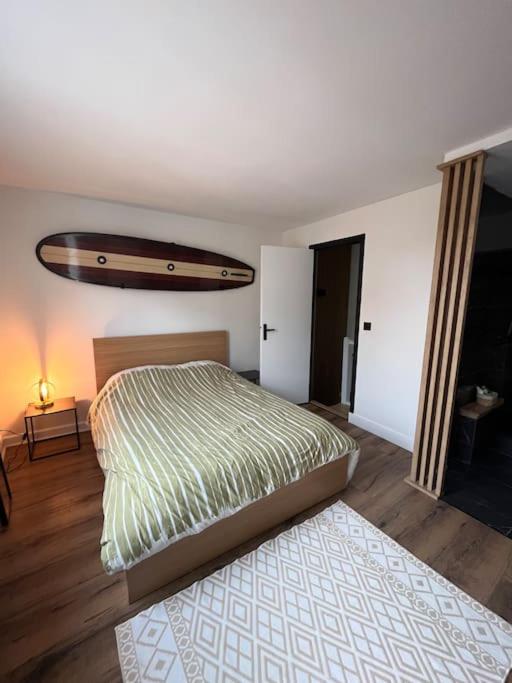 Postel nebo postele na pokoji v ubytování Le Duplex de la côte