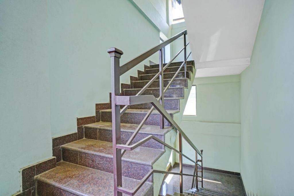 Fotografie z fotogalerie ubytování Hotel O SS Residency v destinaci Punalūr