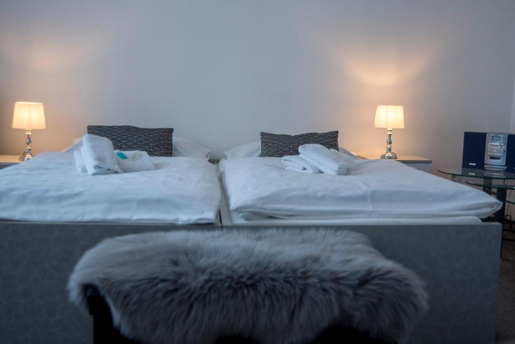 Postel nebo postele na pokoji v ubytování CLASSIC apartmány Třinec