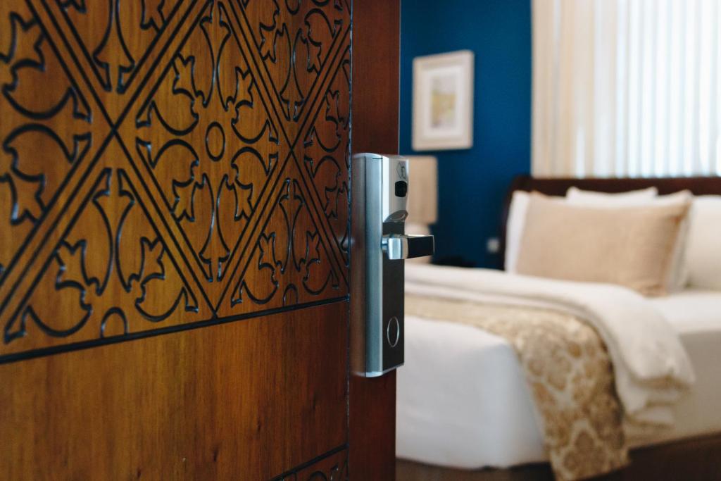 Postel nebo postele na pokoji v ubytování Delfina Boutique Hotel