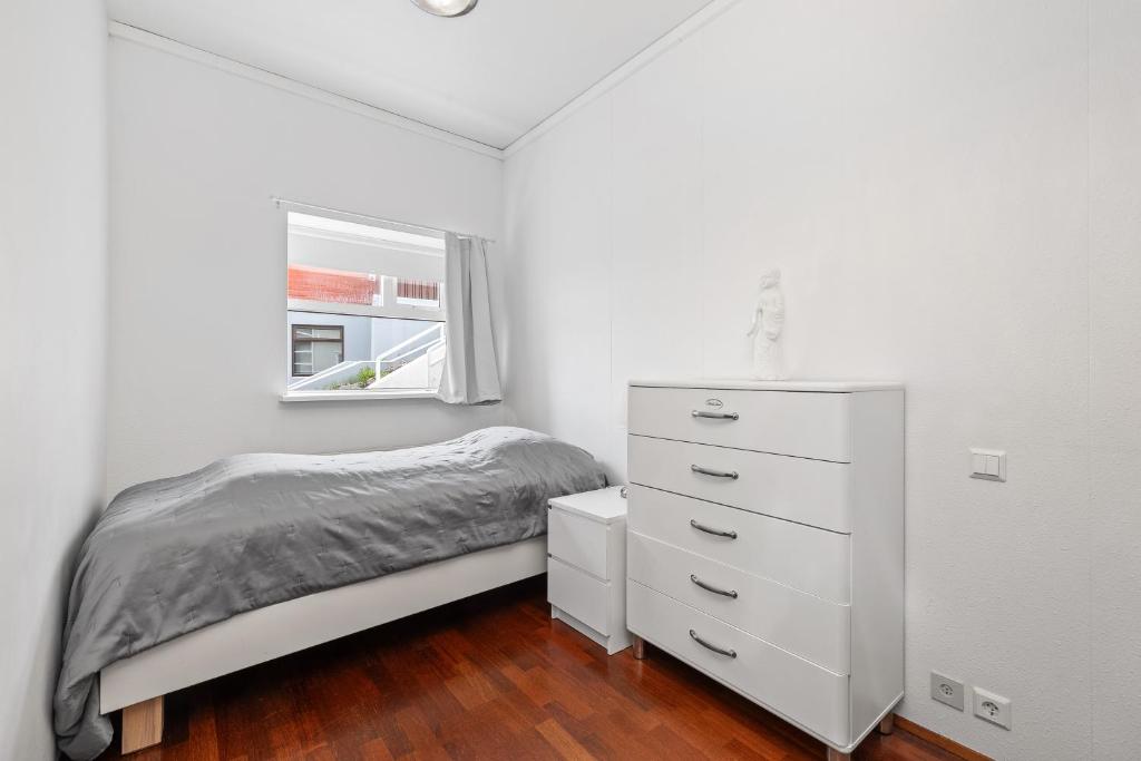 Postel nebo postele na pokoji v ubytování River Apartments