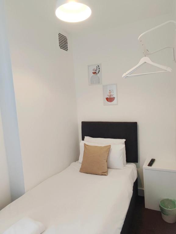 Letto o letti in una camera di Central Wave