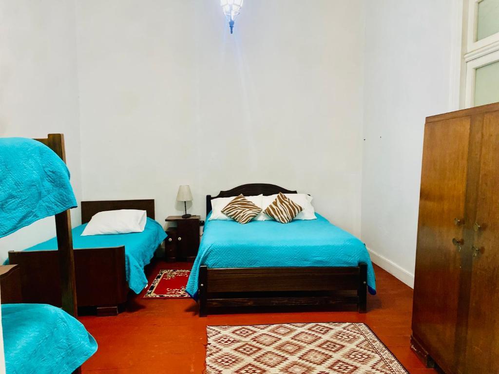 Postel nebo postele na pokoji v ubytování Hotel Dolegant
