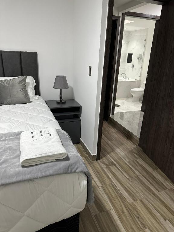Postel nebo postele na pokoji v ubytování home 333 habitacion 337