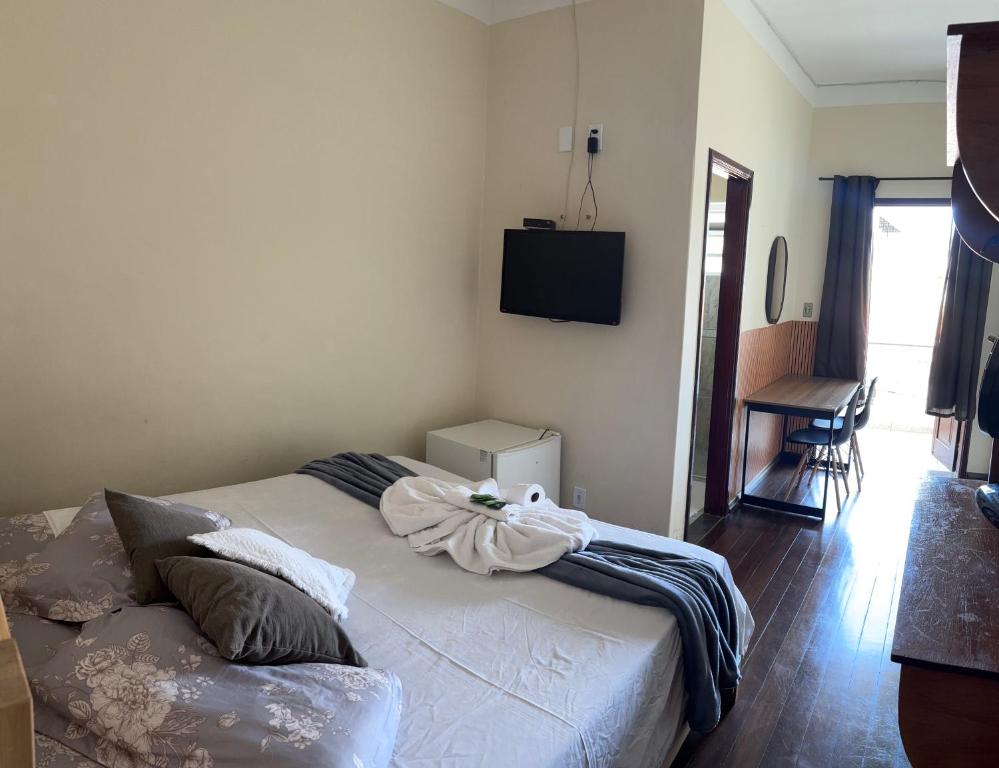 Postel nebo postele na pokoji v ubytování Hotel Chão Mineiro