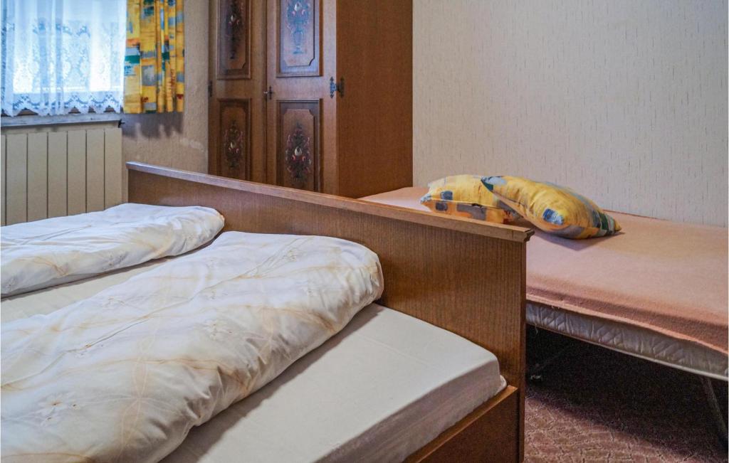 Posteľ alebo postele v izbe v ubytovaní Schoene Ferienwohnung Fuegen