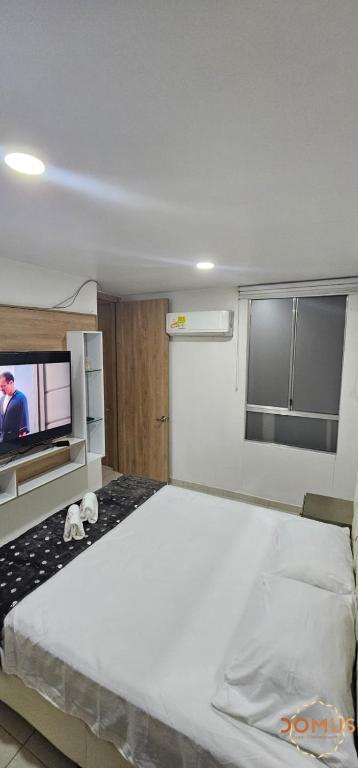 Postel nebo postele na pokoji v ubytování Valparaíso Premier Loft Con Piscina