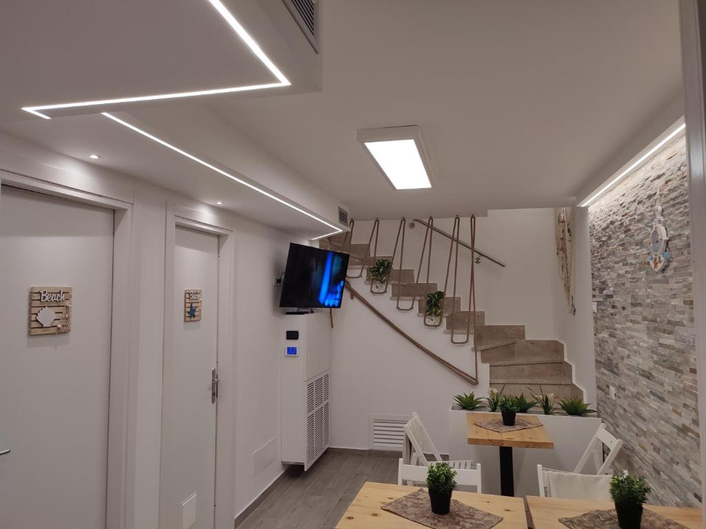 TV a/nebo společenská místnost v ubytování Casa Catalano