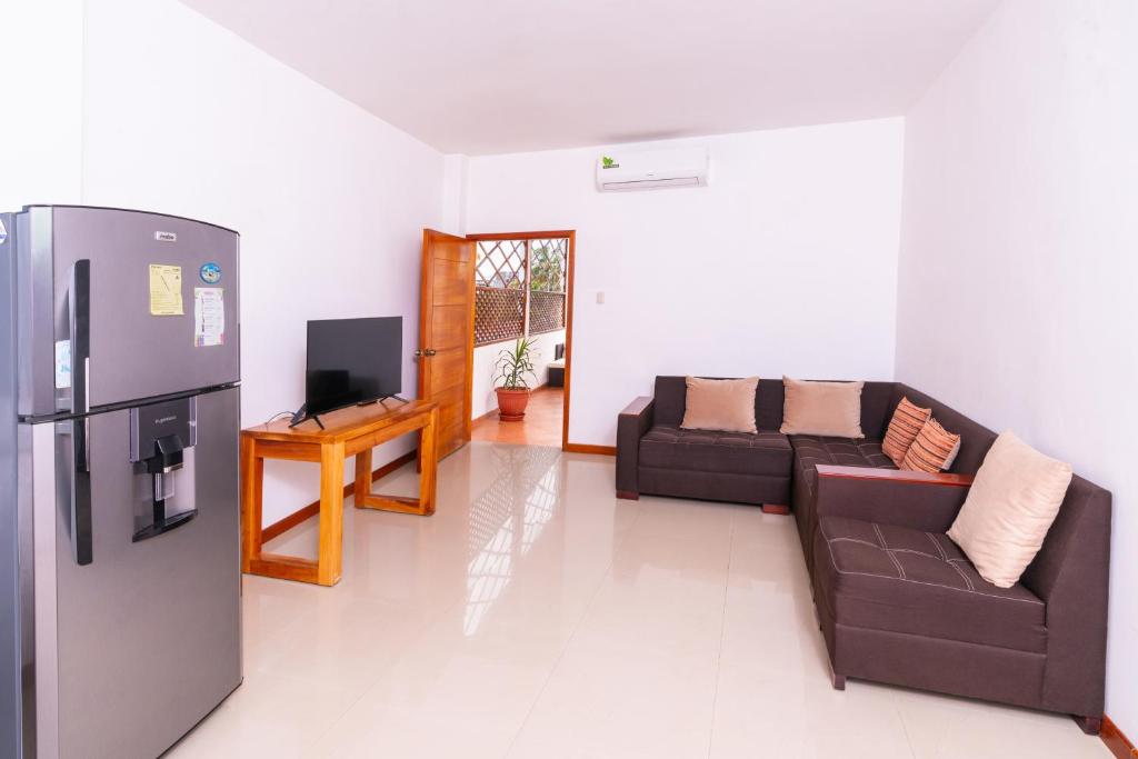 TV a/nebo společenská místnost v ubytování EXCLUSIVE CONDO GALAPAGOS and BEYOND 1