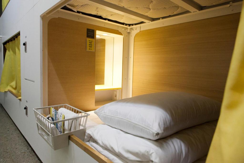 Postel nebo postele na pokoji v ubytování Baguni Hostel