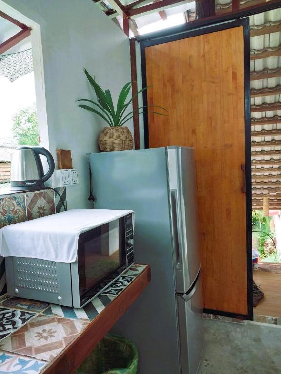 Kuchyň nebo kuchyňský kout v ubytování ANGKOR DINO B&B