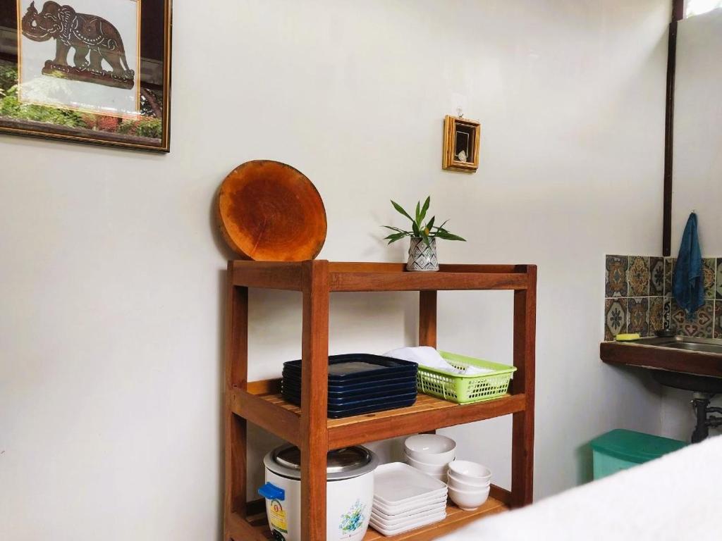 Postel nebo postele na pokoji v ubytování ANGKOR DINO B&B