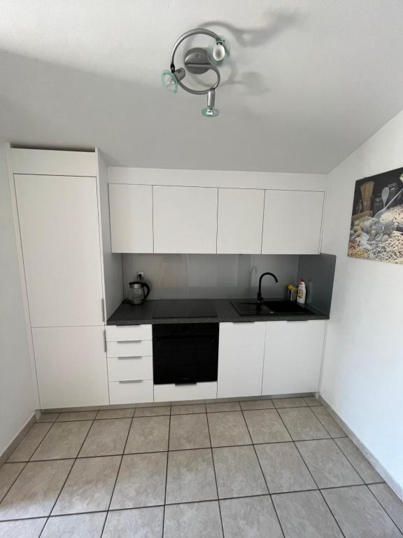 Kuchyň nebo kuchyňský kout v ubytování Apartments Klabjan