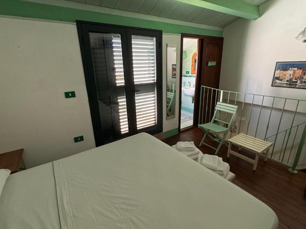 Postel nebo postele na pokoji v ubytování Facussa house