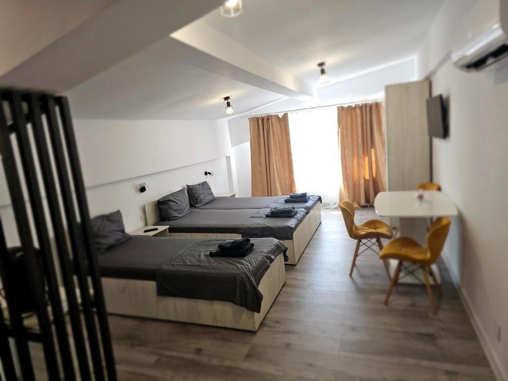 Postel nebo postele na pokoji v ubytování DIDI Apartament