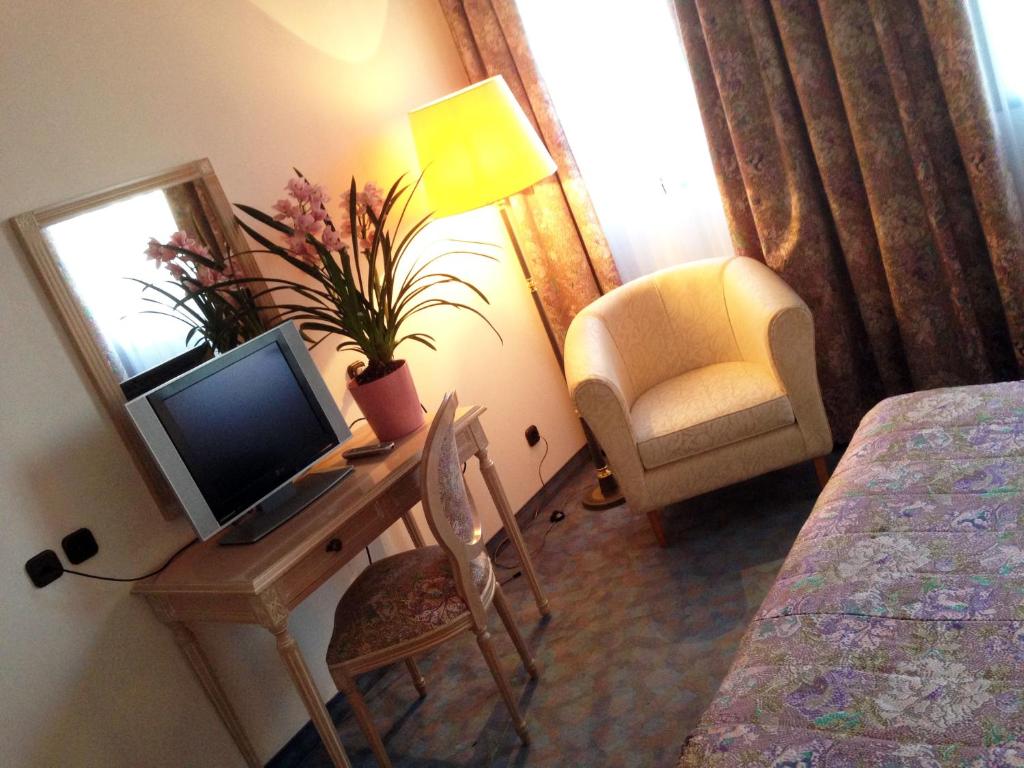TV a/nebo společenská místnost v ubytování Hotel Ca' Brugnera