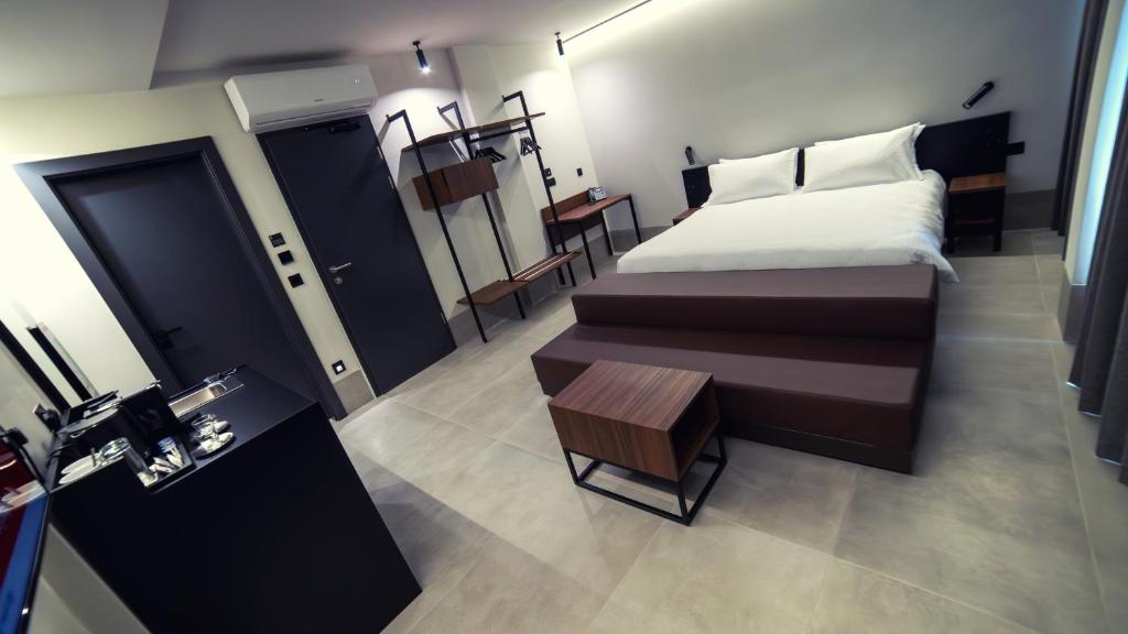Postel nebo postele na pokoji v ubytování Onyx Hotel