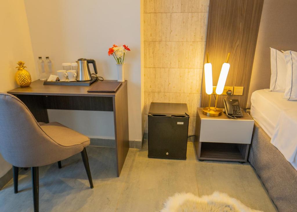 Postel nebo postele na pokoji v ubytování Baraka Tower Hotel