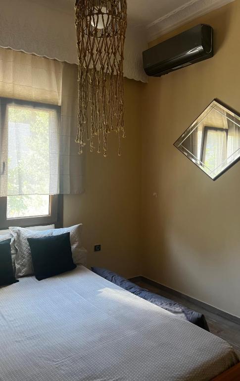 Postel nebo postele na pokoji v ubytování Marios House
