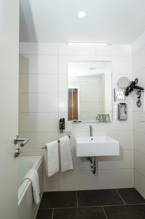 Koupelna v ubytování Hotel Astor