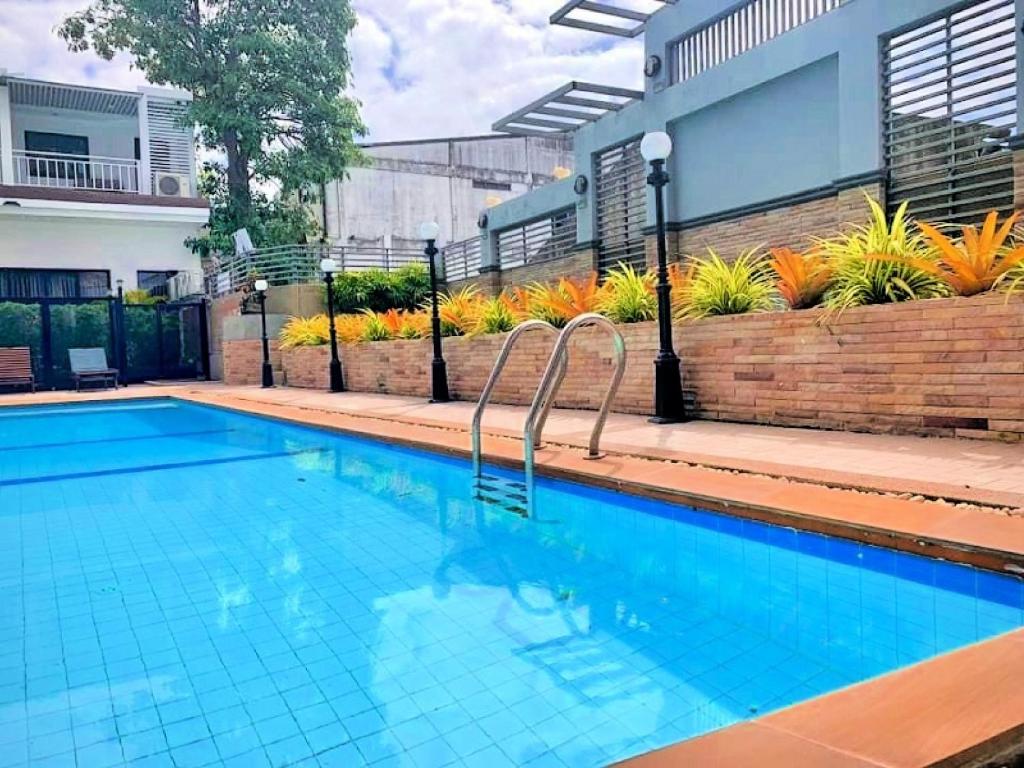 Bazén v ubytování Tanawit Hotel Hua Hin nebo v jeho okolí