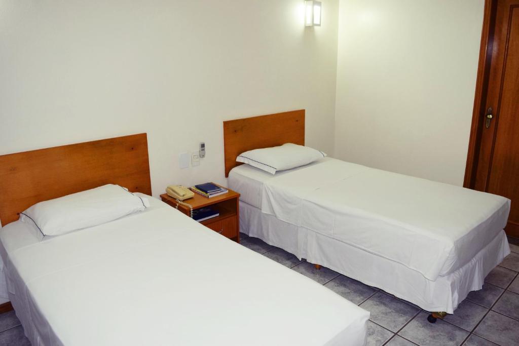 Uma cama ou camas num quarto em Hotel del Príncipe
