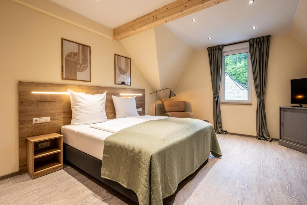Postel nebo postele na pokoji v ubytování Apart Hotel Lang