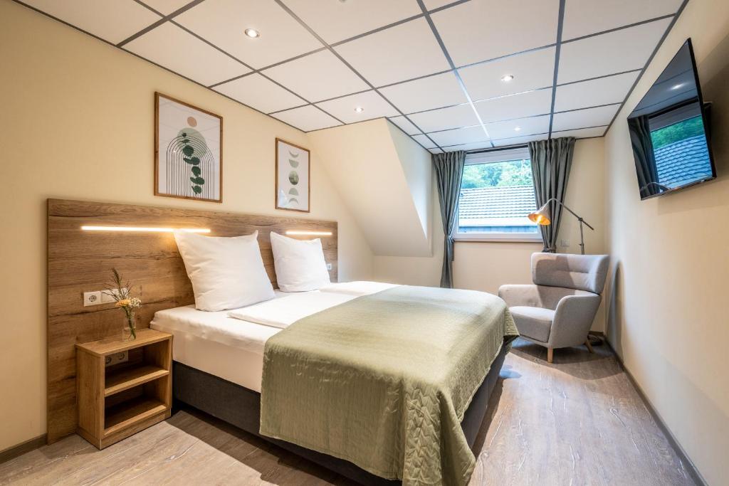 Postel nebo postele na pokoji v ubytování Apart Hotel Lang