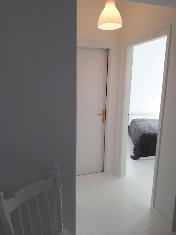 Postel nebo postele na pokoji v ubytování VK's Downtown Suite