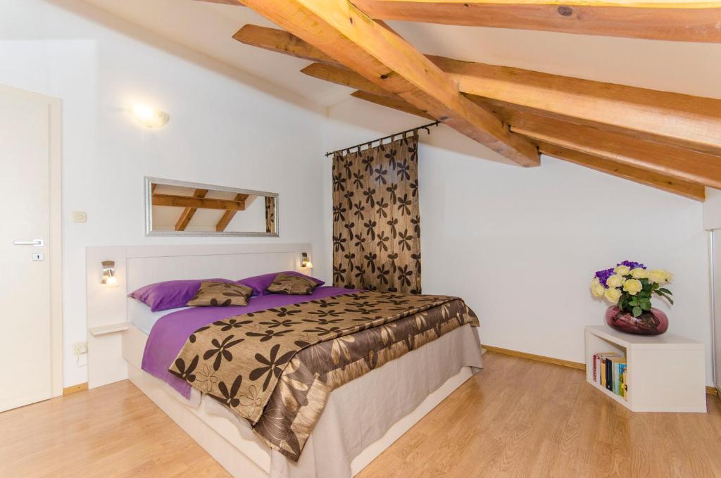 Posteľ alebo postele v izbe v ubytovaní Apartment Diocletians Split Center