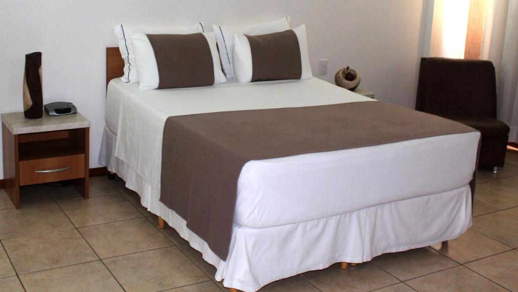 Uma cama ou camas num quarto em Hotel del Príncipe