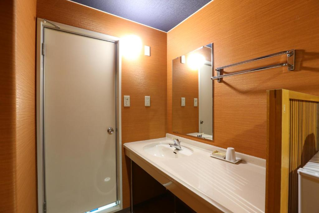 Koupelna v ubytování Hotel Yudanaka